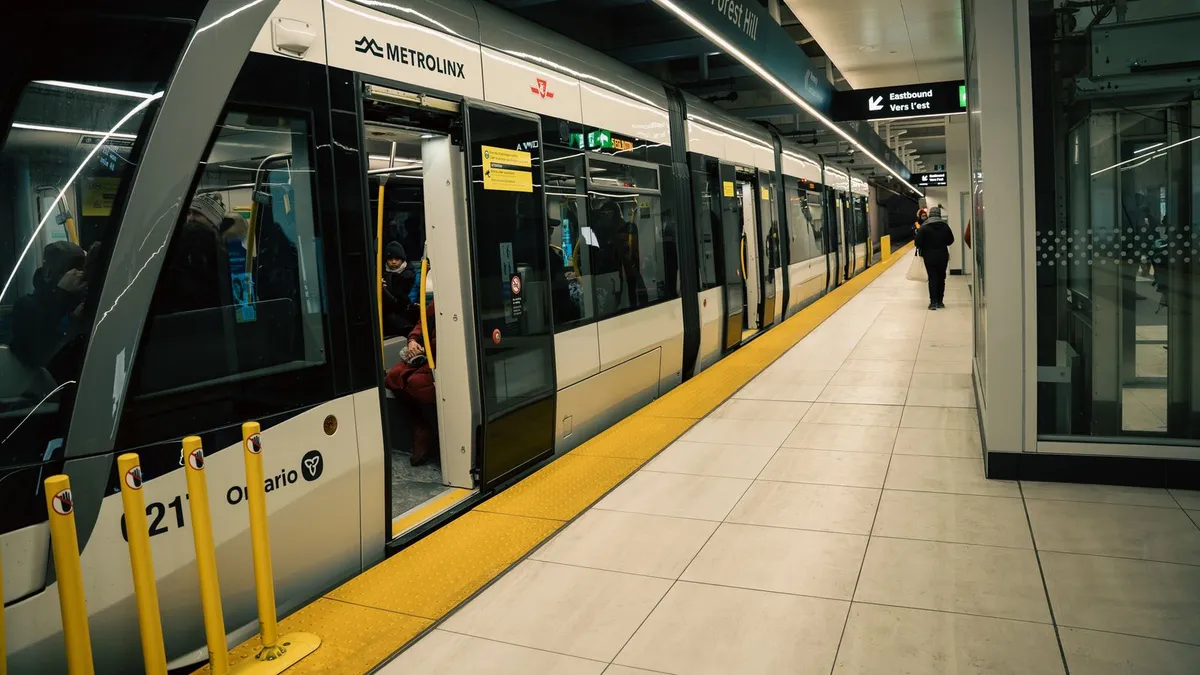 TTC subway commuters at a Toronto station, the daily route for Scarborough workers heading downtown